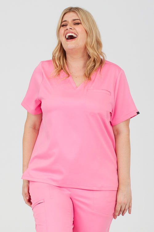 The Atmosphere One-Pocket Scrub Top - Lotus Pink