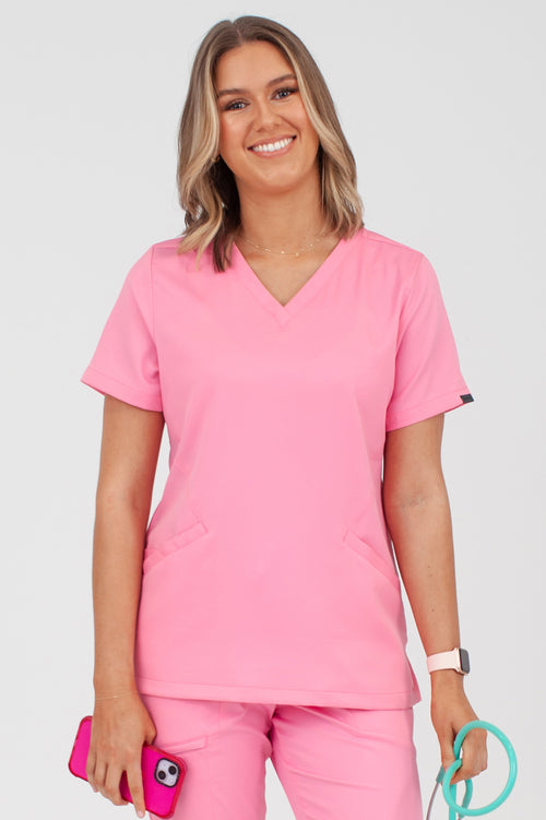 The Hemisphere 4-Pocket Scrub Top - Lotus Pink