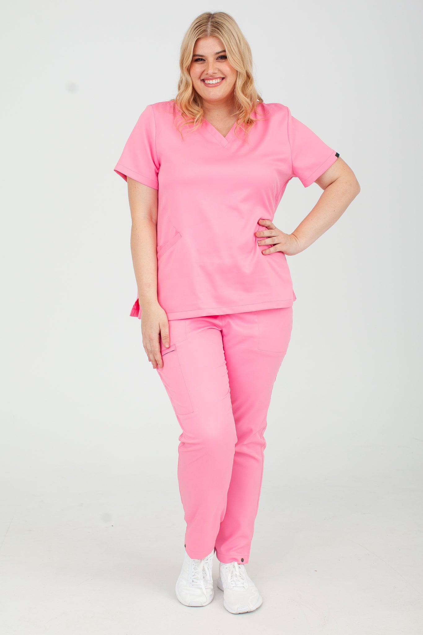 Pink Srub The Hemisphere 4-Pocket Scrub Top - Lotus Pink – Sustainable Scrubs