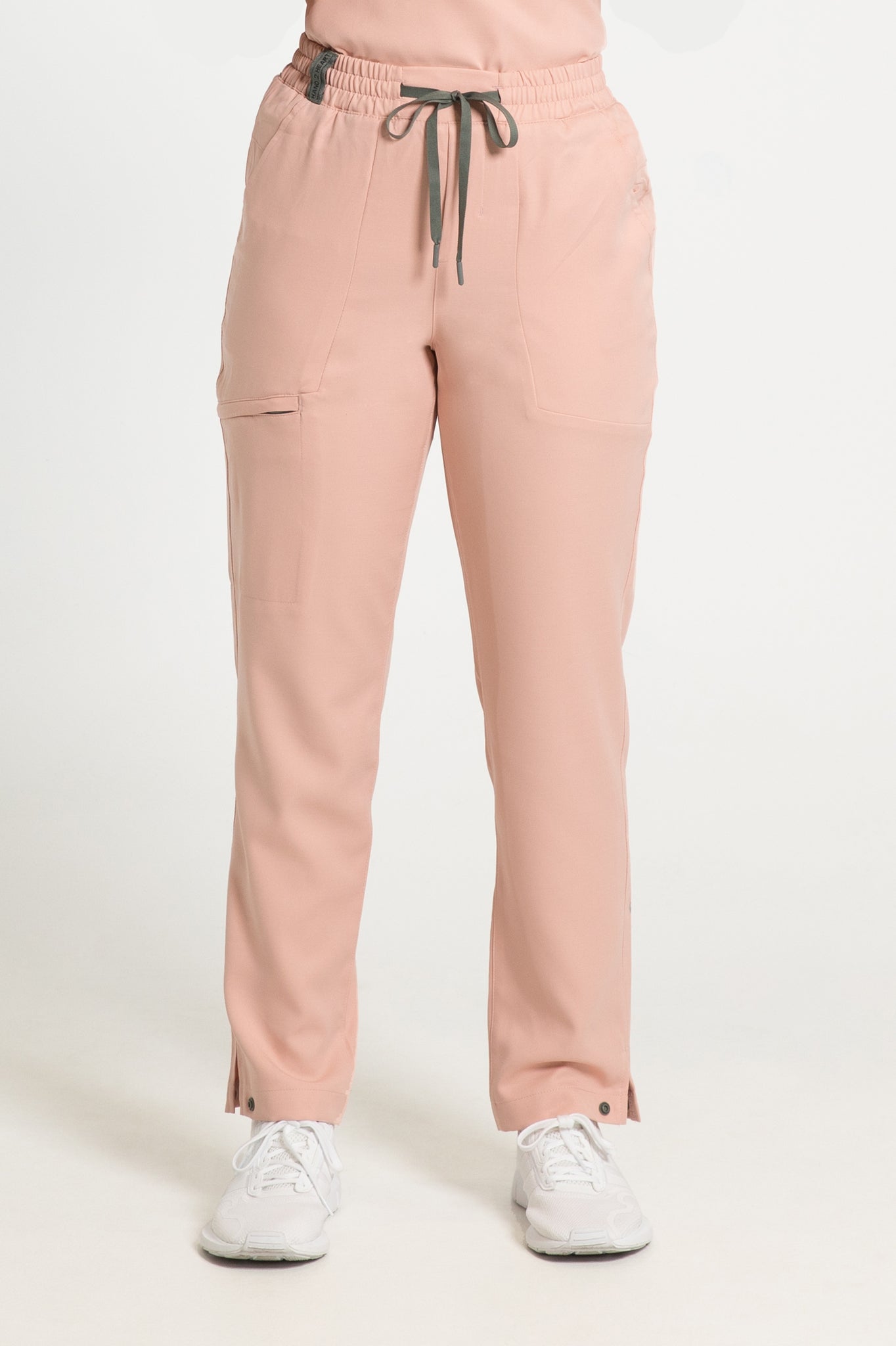 https://sustainable-scrubs.com/cdn/shop/files/The-Cumulus-Scrub-Pants-Womens-Coral-Pink-Hand2Heart-Smart-Sustainable-Scrubs-front-7982copy_2048x2048.jpg?v=1696928994